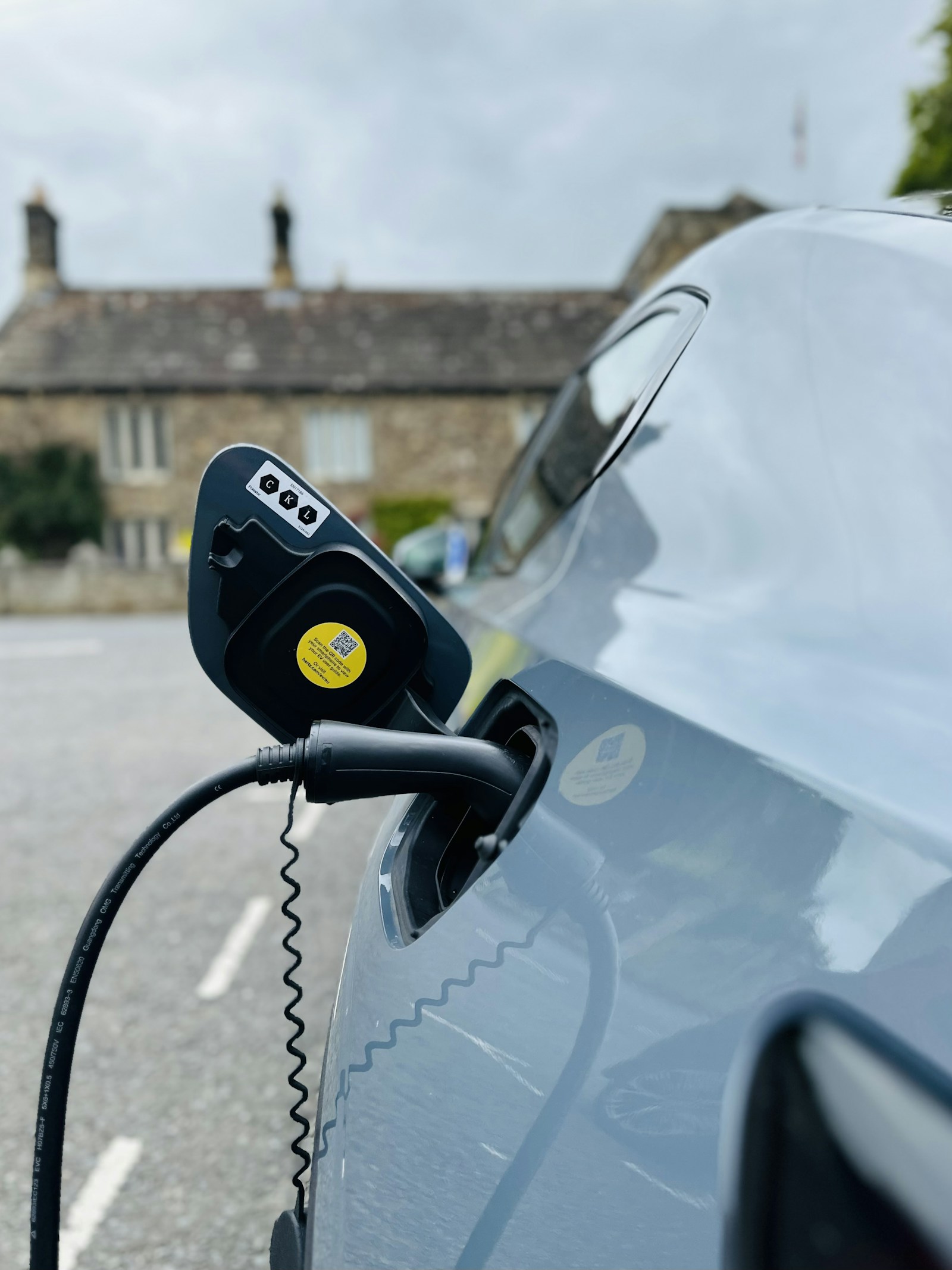 Illustrative photograph of electric vehicle charging.